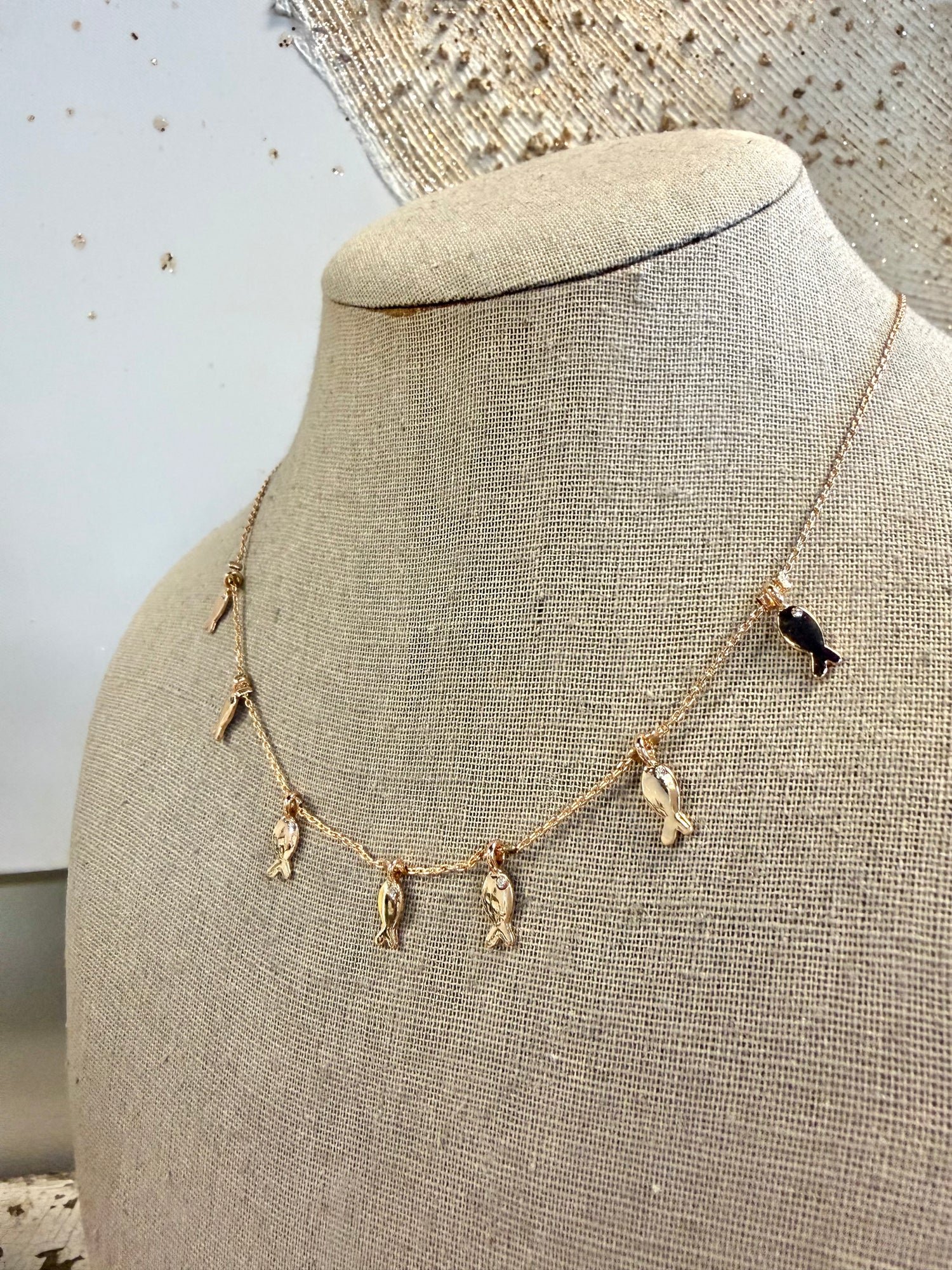 Delicate fish charm pendant stationed fine chain
